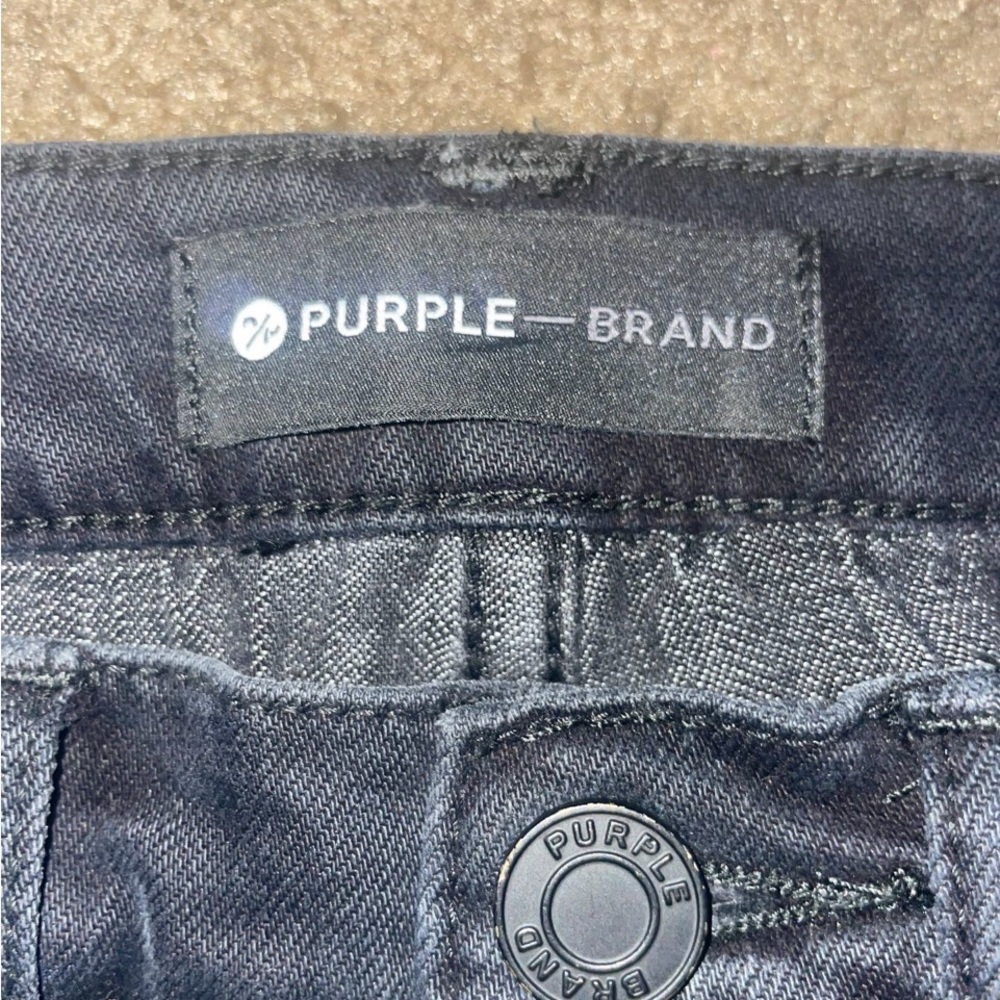 Purple jeans size 28 selling for $200